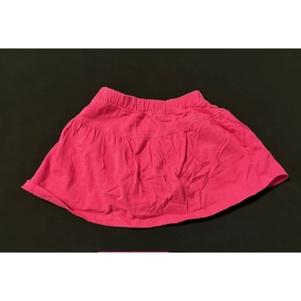 Childrens Place bright pink skirt with attached bloomers, size 12 months
